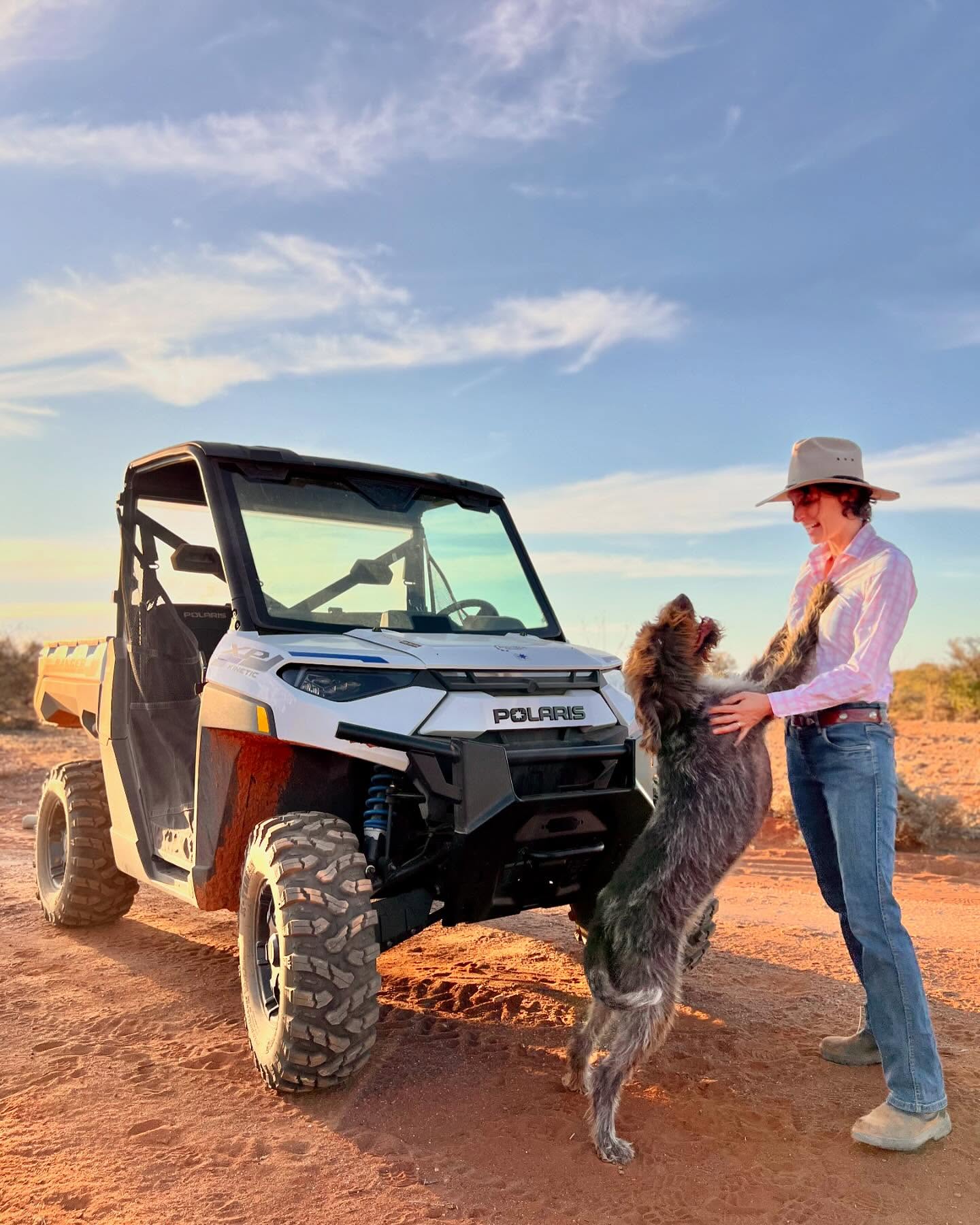 Anika, her dog and a solar powered ATV